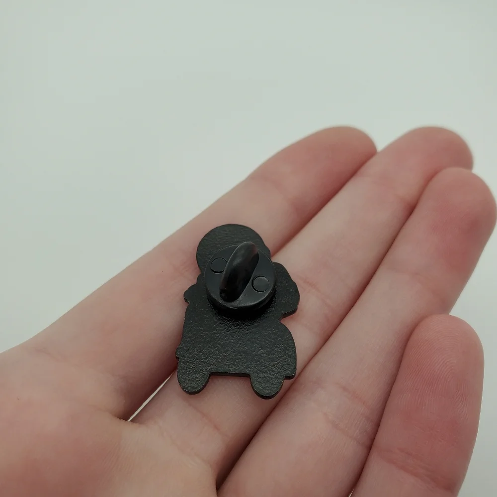 Astronaut on a bike pin
